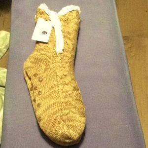 NWT faux fur slipper socks.  Tan.  Size 4-10.